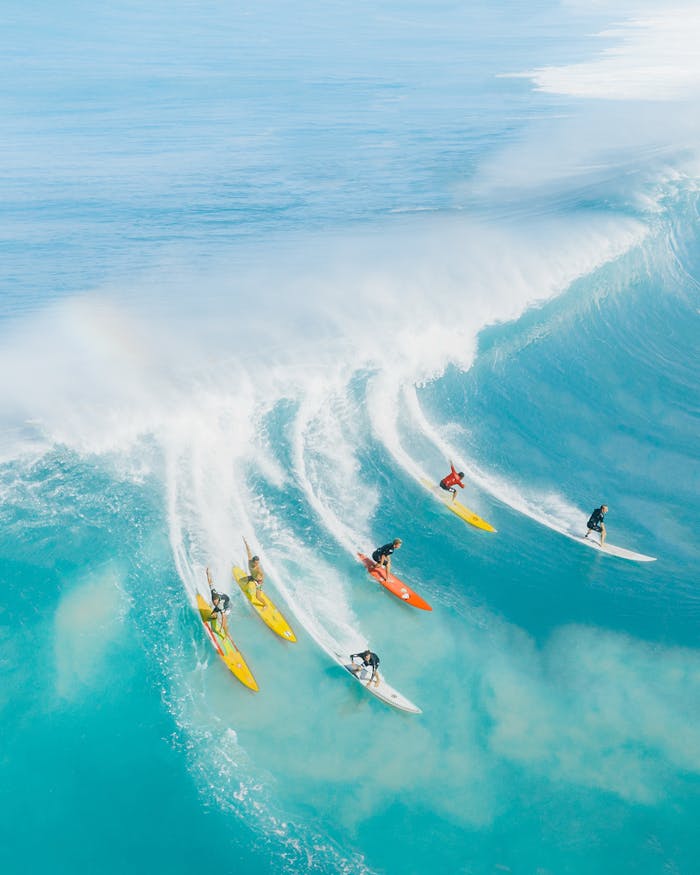 pexels-photo-4319752 People Surfing on Sea Waves